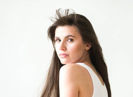 Woman casual portrait brunette female long hair natural make upの写真素材