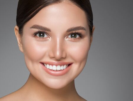 Beauty woman healthy teeth smile healthy beautiful skin model face skin care happy femaleの写真素材