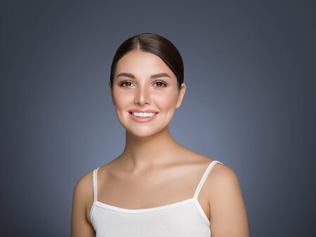 Beauty woman healthy teeth smile healthy beautiful skin model face skin care happy femaleの写真素材