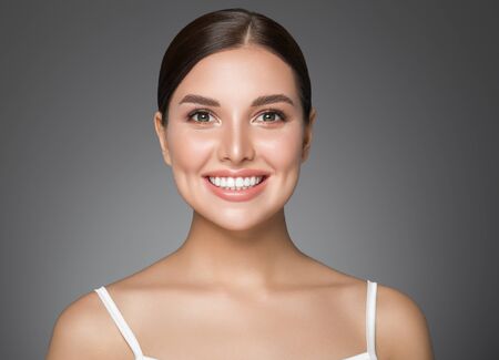 Beauty woman healthy teeth smile healthy beautiful skin model face skin care happy femaleの写真素材