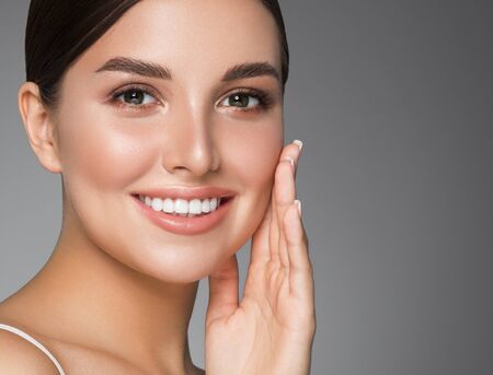 Beauty woman healthy teeth smile healthy beautiful skin model face skin care happy femaleの写真素材