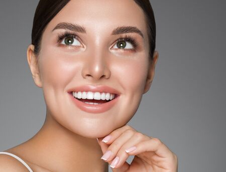 Beauty woman healthy teeth smile healthy beautiful skin model face skin care happy femaleの写真素材