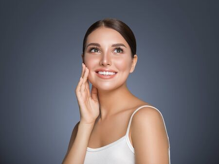 Beauty woman healthy teeth smile healthy beautiful skin model face skin care happy femaleの写真素材
