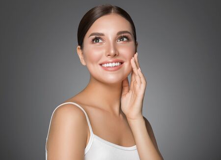 Beauty woman healthy teeth smile healthy beautiful skin model face skin care happy femaleの写真素材