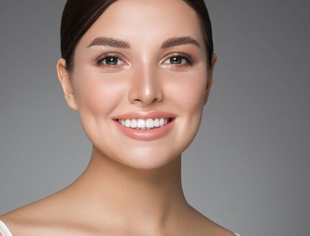Beauty woman healthy teeth smile healthy beautiful skin model face skin care happy femaleの写真素材