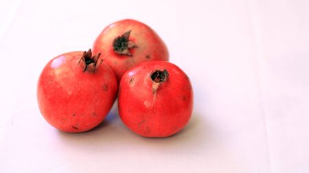 Pomegranate fruits on a white background.の写真素材