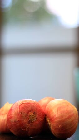 Onions (Red) on a kitchen platform.の写真素材