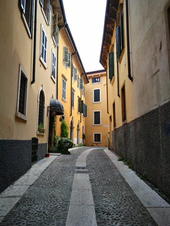 Narrow street in the center of Verona, Italyの写真素材