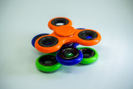 Colorful fidget finger spinner stress, anxiety relief toyの写真素材