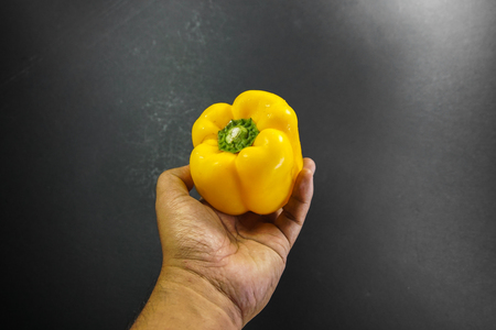 Colorful capsicum on wooden table background.Image with selective focus.の写真素材