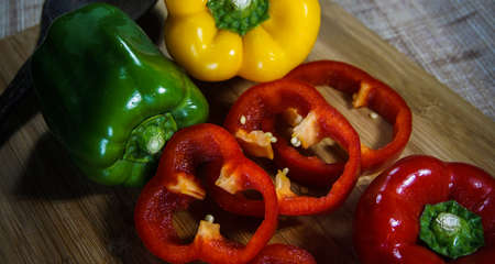 Colorful capsicum on wooden table background.Image with selective focus.の写真素材