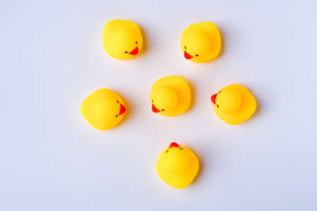 Yellow rubber ducks representing social norms and issues. Pandemic issues.の写真素材