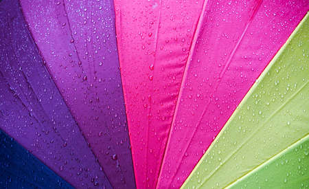 waterdrops on colorful umbrellaの写真素材
