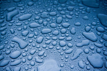water drops on blue backgroundの写真素材