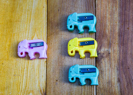 colorful Sharpeners on wooden table backgroundの写真素材