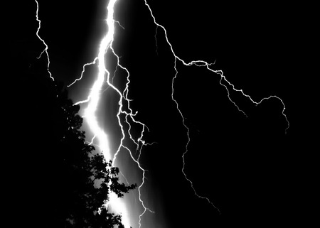 Lightning during a storm in black and white.の写真素材