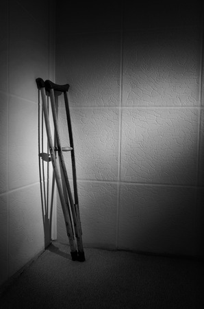 Crutches were in the corner when a man - went on his way.の写真素材