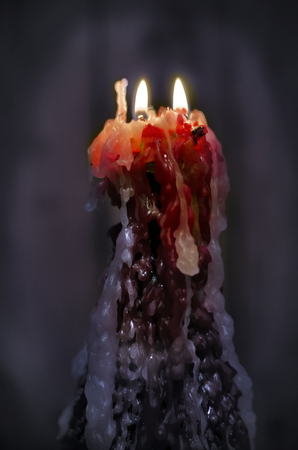 Double candle in a cold room.の写真素材