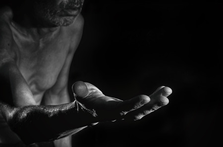 The hand of man who asks for alms.の写真素材