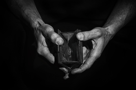 Man shows that there is no money in his wallet.の写真素材