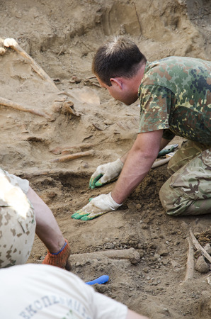 Excavations of burial of soldiers of the Second World War. Kakhovka. Ukraine. 06.24.2017.のeditorial素材