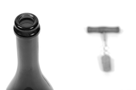 Corkscrew opening the bottle of wine in black and white.の写真素材