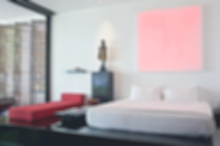 Abstract blur interior luxury living room interior for background. bed, sofa, lamp, door.の写真素材