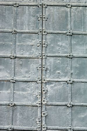 Texture of old gray metal gatesの写真素材