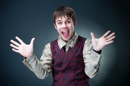 Screaming young man, studio shot の写真素材