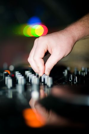Close-up of deejays hand and turntable の写真素材