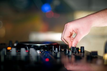 Deejays hand and turntable の写真素材