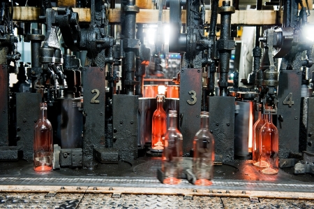 Bottle factory, process of making transparent glass bottles の写真素材