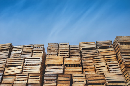 background lot of wooden boxes on palletsの写真素材