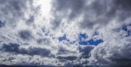 Sky full of clouds on a bright dayの写真素材