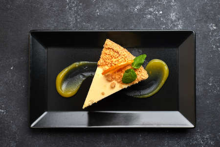 Cheesecake on a black plate