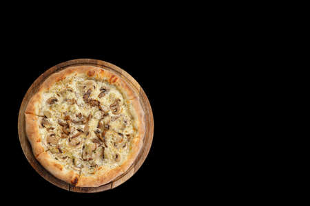 Pizza with mushrooms and chicken on a black background, fast food. isolateの写真素材