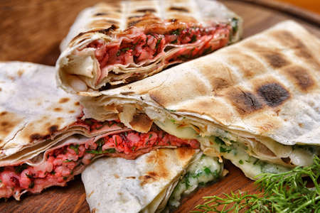 Lavash with suluguni cheese and tkemali sauce