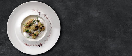 kurze dish on a plate. on a wooden background with spices. Horizontal banner