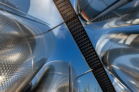Large metal chrome-plated tanks for liquid, winemaking. outdoorの写真素材