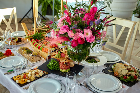 Served furshet table with various banquet dishesの写真素材