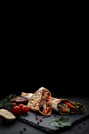 Flavorful shawarma featuring tender meat, and with fresh veggies, with a mouthwatering sauce and topped. Bannerの写真素材