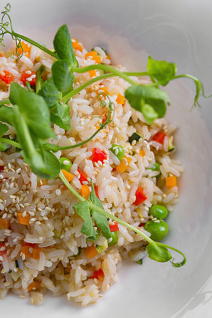 Risotto with vegetables and sesame, Close-upの写真素材