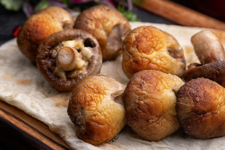 Mushrooms Champignons grilled on a lavash