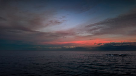 Beautiful ocean sunset cinematic viewの写真素材