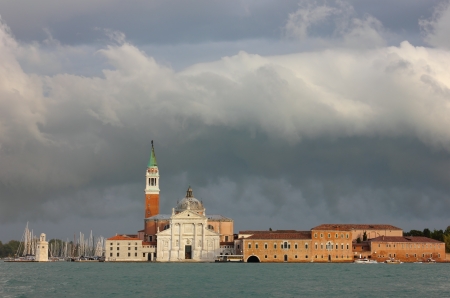 Church of San Giorgio Maggiore in Venice bathing in warm light after the storm.の写真素材