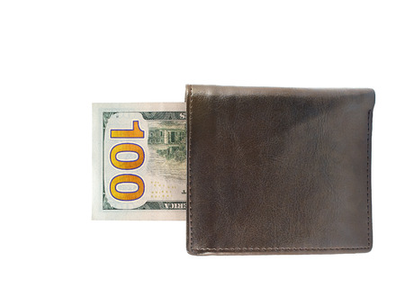 New one hundred dollar bills in leather wallet isolated over white backgroundの写真素材