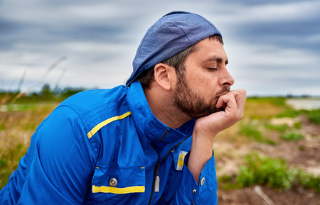 Pensive meditative man on sea background