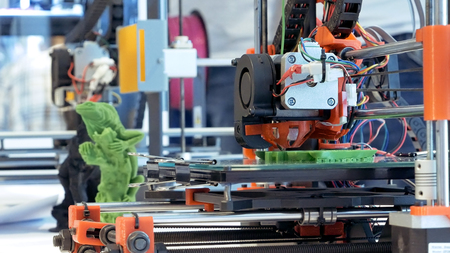 Automatic three dimensional 3d printer performs product creation. Modern 3D printing or additive...