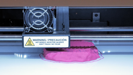 Automatic three dimensional 3d printer performs product creation. Modern 3D printing or additive...