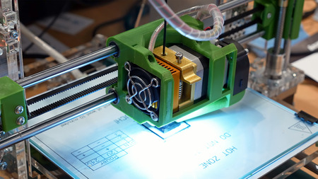 Automatic three dimensional 3d printer. Modern 3D printing technology. Close-up shot.
